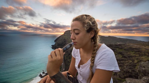 A healthy toke at the top of a hike—minus the smoke.
