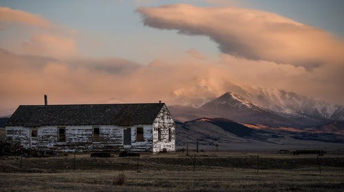 Perched in an open field among the Rockies, this library demands that readers get close to nature and be inspired by their surroundings. Pictured here is the Cook's House, a historic structure of the ranch that's being renovated for guest lodging.