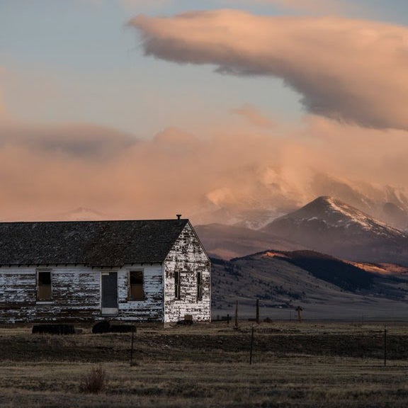 Perched on an open field, among the Rockies, this library demands readers to get close to nature and be inspired by their surroundings. Pictured here is the Cooks House—a historic structure of the ranch that is being renovated to house guests.