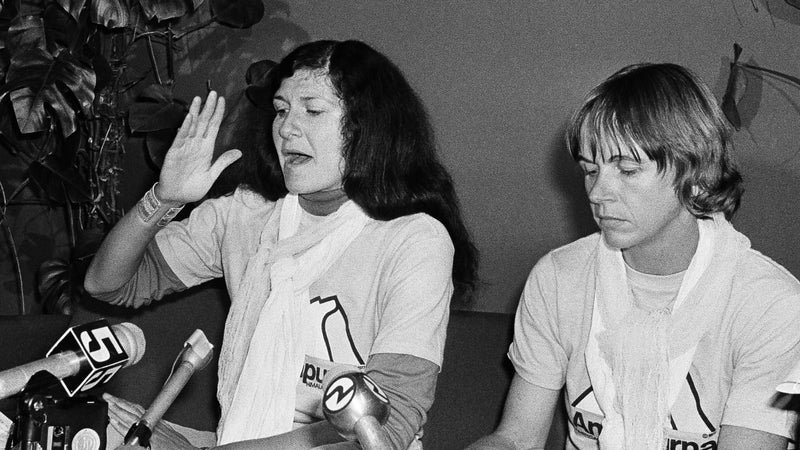 Blum and Miller at a post-climb press conference in San Francisco