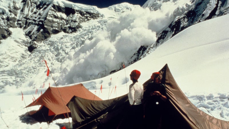 Blum watching one of the frequent avalanches that threatened the expedition