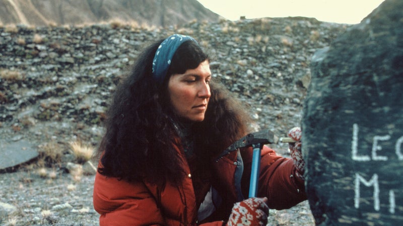 Etching the names of Chadwick-Onyszkiewicz and Watson at base camp