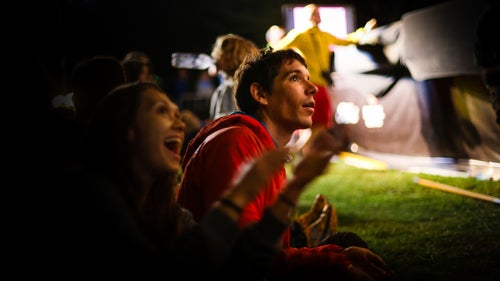 Alex Honnold watches the finals.