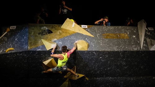 Felipe Camargo (Brazil) navigates his way over a protrusion during the finals' last route, which was comprised solely of volumes.