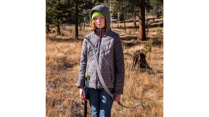 Nicole McCloskey, 12,  poses for a portrait on the archery range.