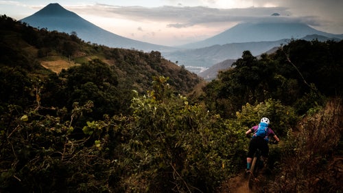 Berne Broudy, a freelance journalist, rides the Cielo Grande Trail back into Antigua. The trail drops 2,500 feet for more than eight miles through working avocado, tomato, and flower farms. Halfway down,