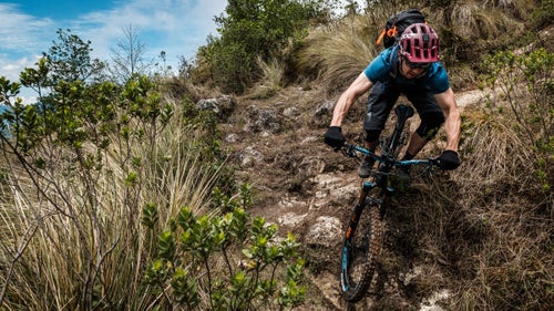 Eric Porter rides the rugged Slickrock Trail in the highlands above Antigua. Slickrock drops more than 3,000 feet over ten miles on some raw and rowdy Mayan footpaths. No sustainable trail building here, just thousands of years of foot traffic between small villages.