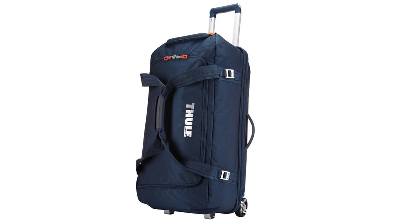 Large capacity gear bag with a wide mouth access to easily load helmets, boots, gloves, jackets and other travel essentials.