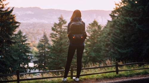 The Showers Pass Transit bag is great for every type of weather, features a U-locket pocket, and has red lights built in to keep you safe while riding.
