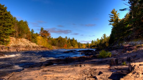 #10 Menominee River
Michigan, Wisconsin
The Menominee, a 115-mile-long river that courses through the forests of Michigan鈥檚 Upper Peninsula, is an outdoorsman鈥檚 paradise. It鈥檚 ideal for rafting and home to plenty of smallmouth bass, trout, and sturgeon. Too bad, then, that Aquila Resources, a Canadian mining company, is currently seeking permits to begin operations along the Menominee鈥檚 banks. The mining would rely on cyanide to extract and process ore and would discharge wastewater directly into the river, according to American Rivers. Groundwater, local animals, and even Lake Michigan would all be threatened if acid mine discharge were to seep into the earth, the group warns.
