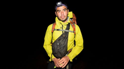Ryan Moss poses for a portrait moments before taking the first steps of his most recent traverse of the Ko鈥檕lau Range.