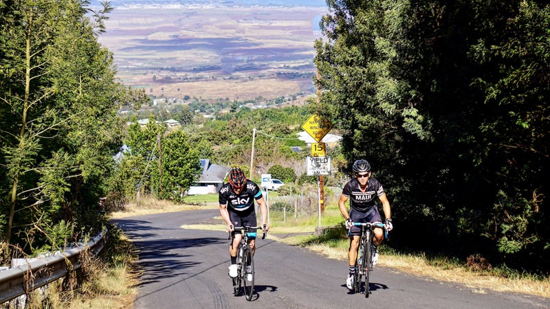 Donnie Arnoult, owner of the Maui Cyclery and Go Ride Maui, on a climb with a client.