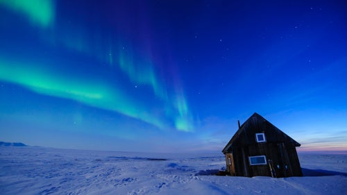 As the sun goes down in the Arctic, the real show begins. Here, the Northern Lights exploded in the sky as we took shelter for the night.