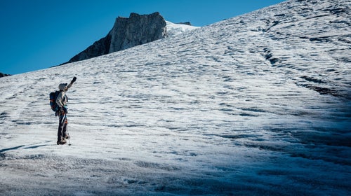 Andrew Yasso stands on a glacier in eastern Greenland.