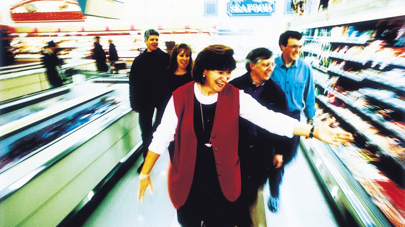 Burke (far right) tagging along with nutritionist Jackie Berning during Tour de Safeway.