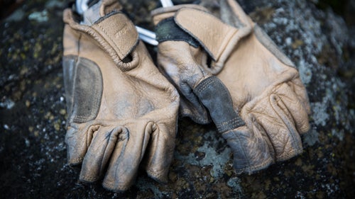 Smith needs gloves to protect his hands during the rope work and knuckle bashing of a big-wall technical rescue and during a long carry-out of a patient in a litter. Metolius鈥檚 Climbing Gloves are his favorite for a few reasons. They fit his fingers, which are swollen from decades of climbing use, plus the half-finger design provides ventilation and dexterity.