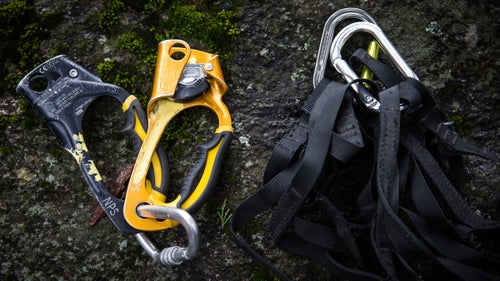 It鈥檚 not uncommon for Smith to ascend 1,000 or more feet of fixed ropes to reach the site of an accident, so he always carries Petzl鈥檚 Ascension rope clamp (left, in black and yellow), combined with lightweight aiders like Yates鈥檚. The Ascension is the gold standard among climbers: Smith credits the ergonomic, easy-to-use lever for its popularity. Yates鈥檚 3/4-inch aiders are much lighter and take up less space in a pack than the typical big-wall varitty. While not great for actual aid climbing, they鈥檙e perfect for ascending ropes and moving around during a technical rescue.