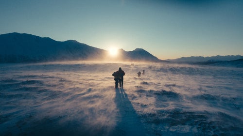 As the sun rose over the Alaskan Range, we pushed our bikes into a fierce headwind, often searching blindly for the vanishing trail as we approached Hell’s Gate and Ptarmigan Pass, about a quarter of the way through the race.