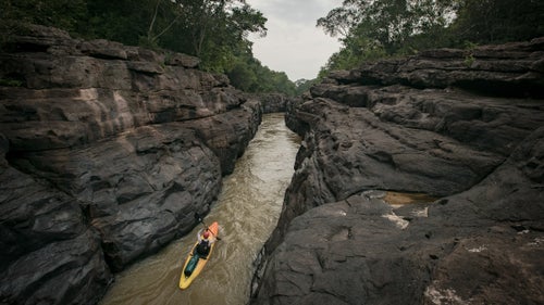 Aniol Serrasolses, an Extreme Kayak World Champion from Spain, paddles through the Chiribiquete Gorge on April 7, the eighth day of the expedition. Though the team saw traces of FARC activity along the way, they saw few people during the first 500 miles of the expedition.