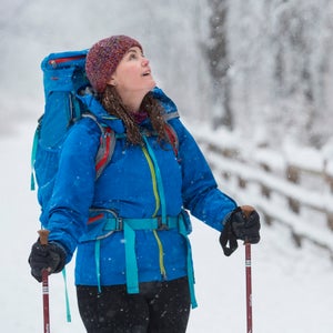 SACO, ME - APRIL 1: Forty year-old Tonya Holt hikes on the Eastern Trail in Saco, Maine during a spring snowstorm. The Maine native is attempting to hike the Applachian Trail from Georgia to Maine in hopes of a