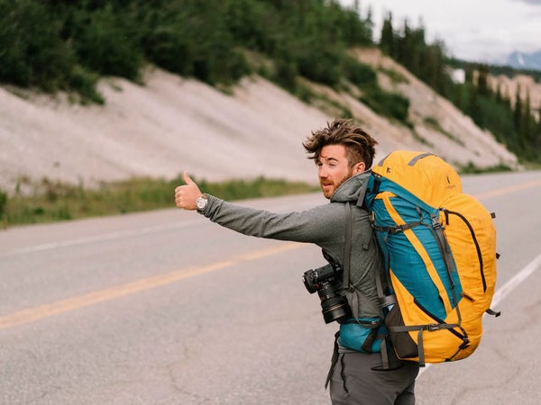 Chris Brinlee Jr. hitching a ride to the middle of nowhere—with his camera gear, of course.