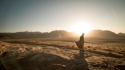 Sunset in the desert, where the fine red sand felt almost like velvet.