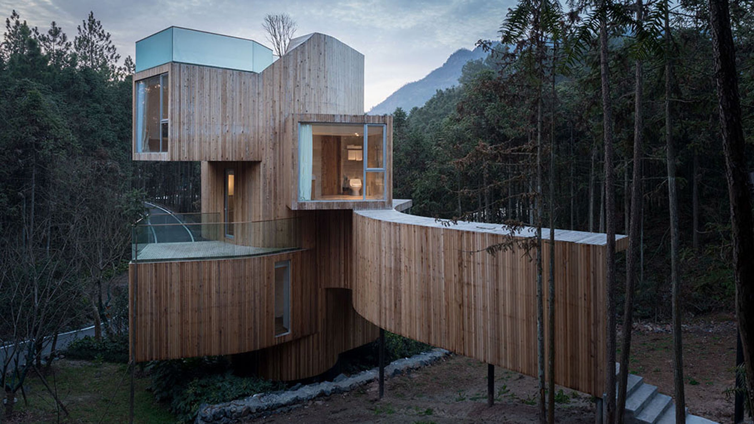 A seven-story tree house tucked away in the forrest in China. 