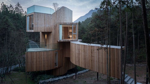 A seven-story tree house tucked away in the forrest in China.
