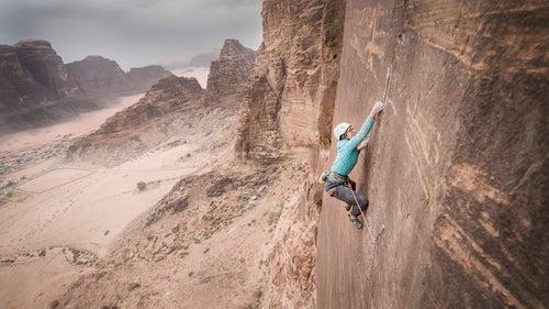 This January, in the heart of the Middle East, a crew of rock climbers set out to establish an 1,800-foot, 14-pitch, 5.13+ route up Jordan鈥檚 Jebel Rum. On the outskirts of Wadi Rum, a region in the southern part of the country, the team composed of Mohammad Hussein, Madaleine Sorkin, Elad Omer, and Eli Nissan linked up with the local Bedouin people who have been working hard to establish a market for adventure tourism. After three weeks of cleaning and searching for the best routes, the climbing team left without the opportunity or time for a free ascent. Just two weeks later, another team from the Czech Republic free-climbed the route in a continuous two-day effort with the blessing of the establishing crew. Colorado-based filmmaker Henna Taylor, who is making a movie about the route鈥檚 creation, shares her best shots from the initial trip. Photo: Boulder, Colorado鈥揵ased pro climber Madaleine Sorkin attempts the fourth and most difficult pitch (5.13d) on the project we named the Sultan ul-Mujahidin, which translates to 鈥淪ultan of the Freedom Warriors.鈥