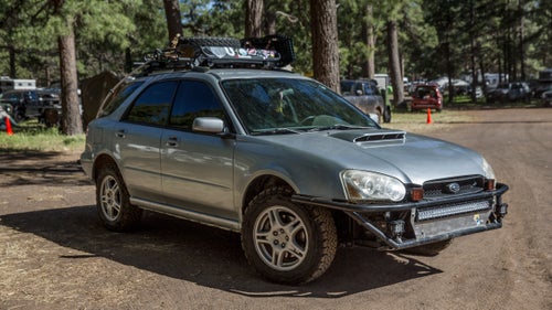 2004 Subaru WRX Wagon
Vans, Tacomas, and Jeeps were the most popular vehicles at the expo. But there were also a handful of tricked-out Subarus, which we’ve always loved for their smart all-wheel-drive systems. This one, owned by Parker Pulido of Las Vegas, Nevada, still has its stock turbo engine but came to the Expo outfitted with all-terrain tires, a new front bumper and light bar, undercarriage armor to protect the differential, and stiffer Forester struts. All that turns an already capable little car into an off-roading beast.
