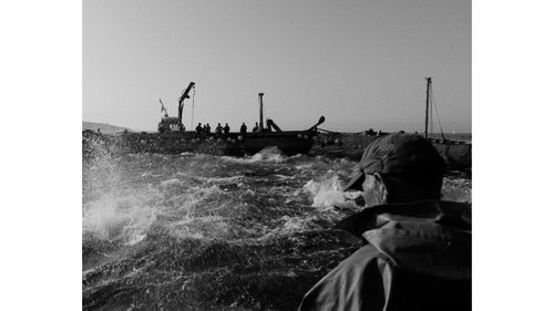 On the captain鈥檚 signal, the boats form into a corral, roughly 300 feet apart, known as the cuadra. The men assemble at the nets, pulling, heaving, and shouting as the walls slowly slide closer together and the whole system is pulled upward. Without warning, the sea goes from dead calm to absolutely boiling鈥攂luefin break the surface in a crush of panic, thrashing and jumping while the space between the boats shrinks by the minute.