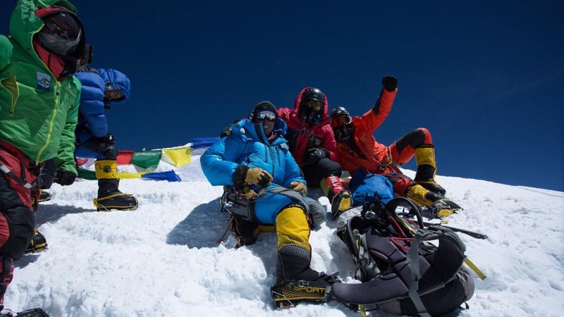 The Alpine Ascents team at the summit of Everest.