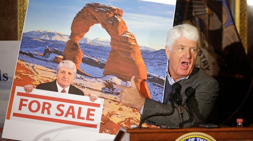 Rob Bishop holds an image he says is misleading while speaking during a news conference at the Utah State Capitol, January 20, 2016, in Salt Lake City.