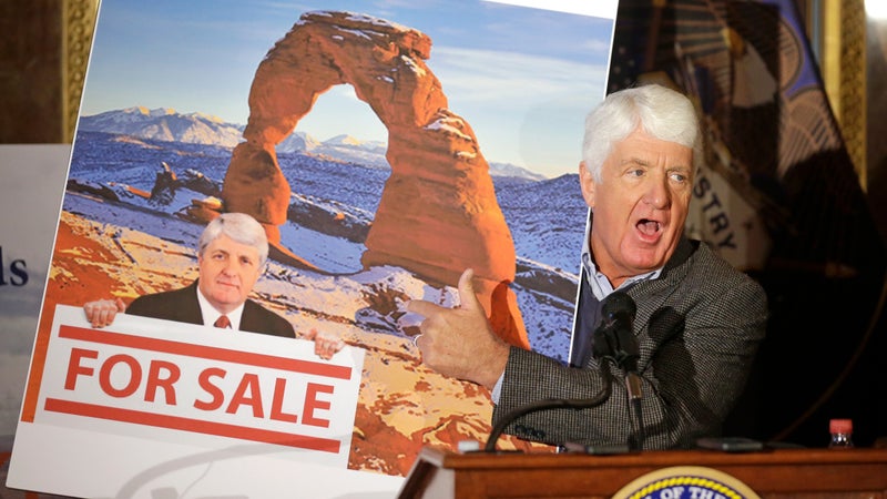 Rob Bishop holds an image he says is misleading while speaking during a news conference at the Utah State Capitol, January 20, 2016, in Salt Lake City.