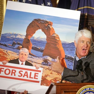 Rob Bishop holds an image he says is misleading while speaking during a news conference at the Utah State Capitol Wednesday, Jan. 20, 2016, in Salt Lake City.
