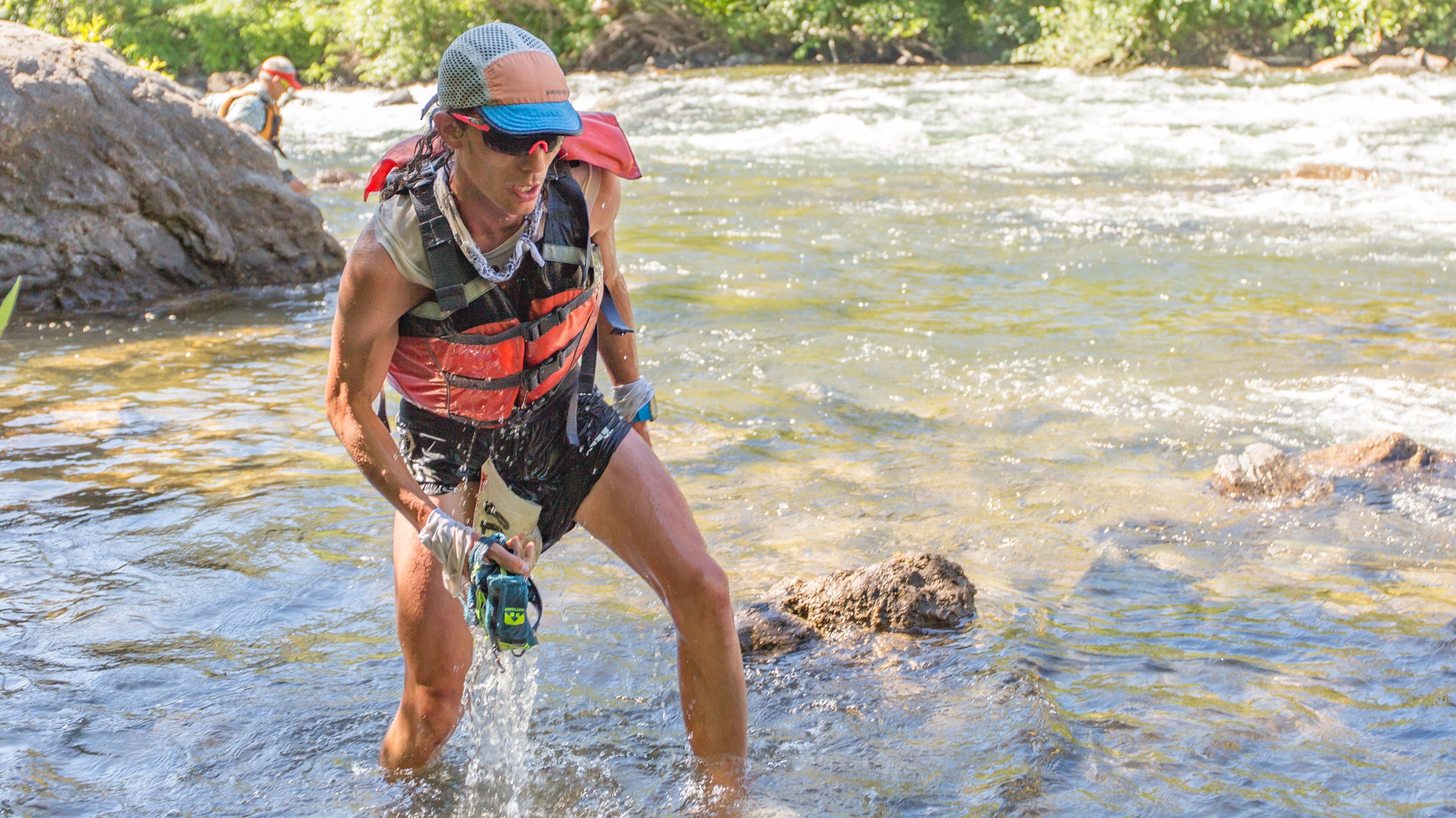 Jim Walmsley crossing the Rucky Chucky river at the 2016 Western States 100.