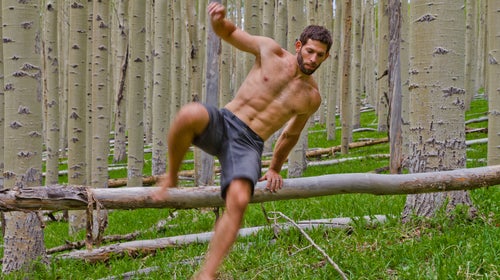 Danny of MovNat demonstrates vaulting over a natural obstacle.