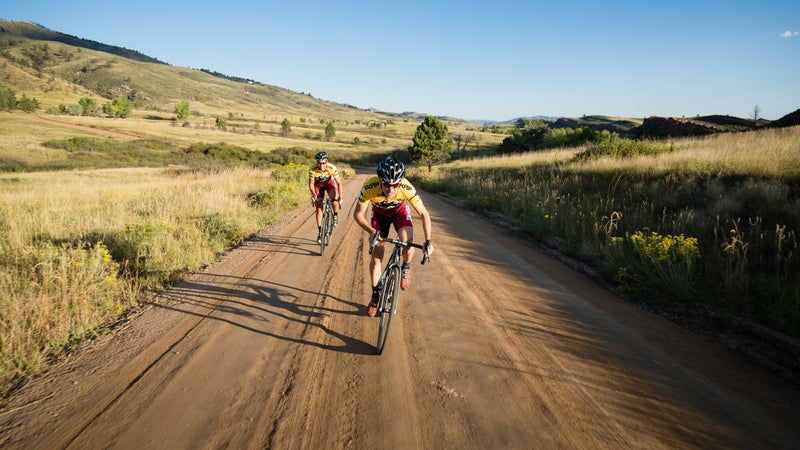 Professional cyclists Allen Krughoff and Meredith Miller ride their cyclocross bikes outside of Fort Collins, Colorado.