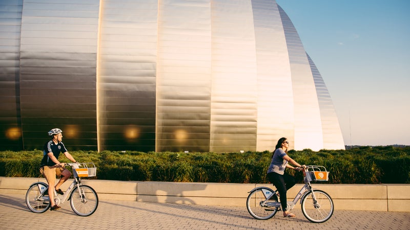 Biking past the Kauffman Center for the Performing Arts in Kansas City, Missouri.