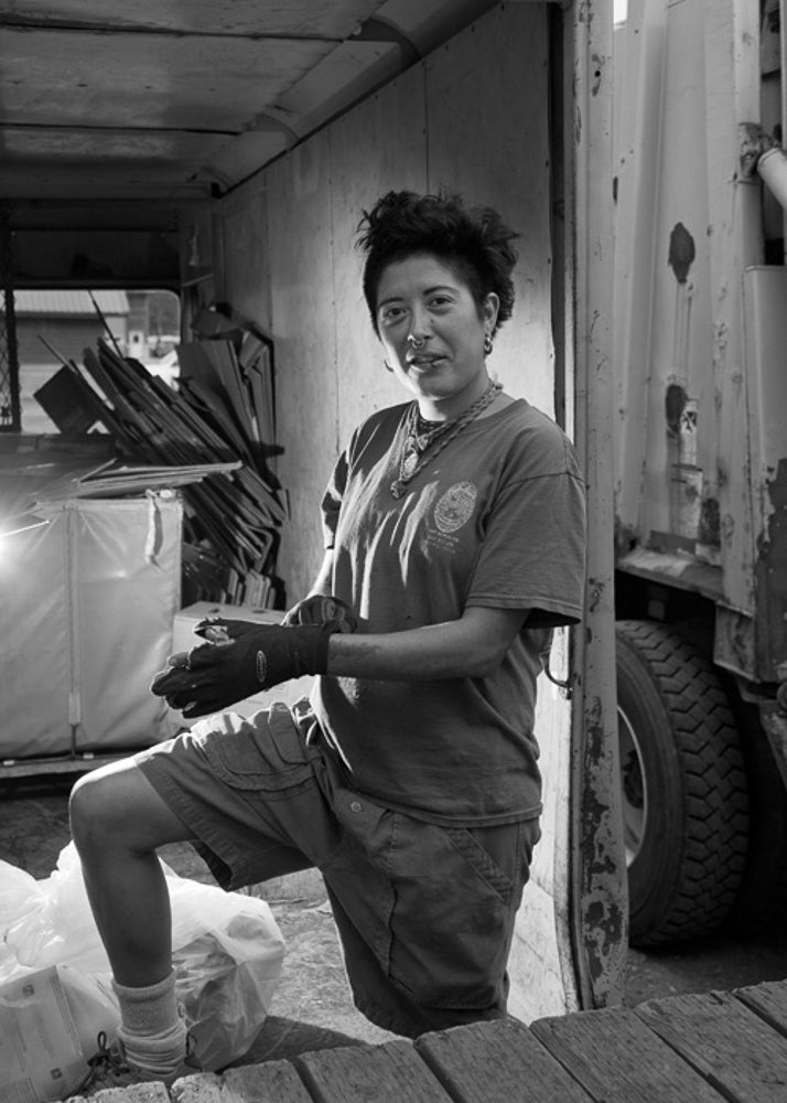 Wendy unloads cardboard for recycling in Yellowstone National Park.