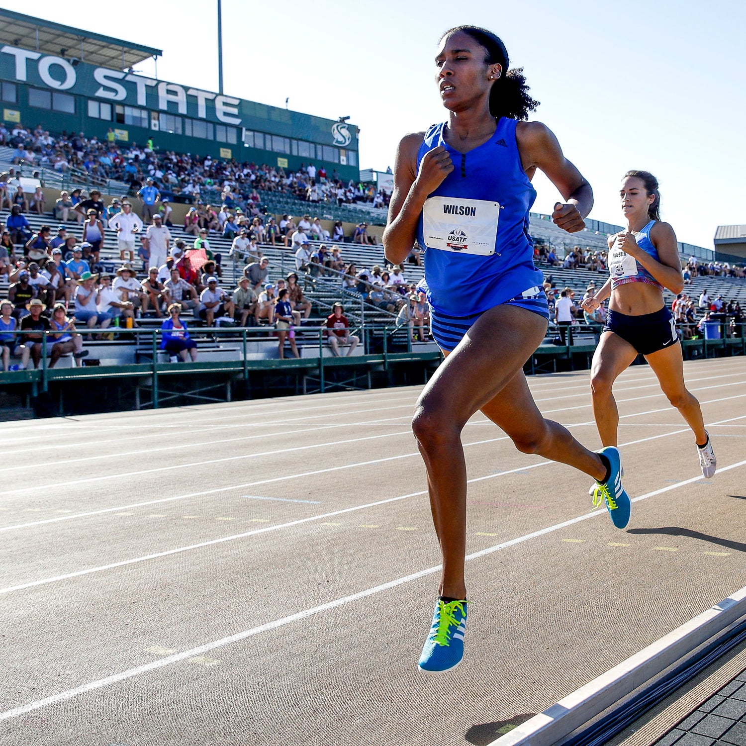 people running track