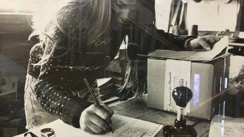 Former Patagonia CEO Kris McDivitt, now Kristine Tompkins, attending to a Patagonia writing order.