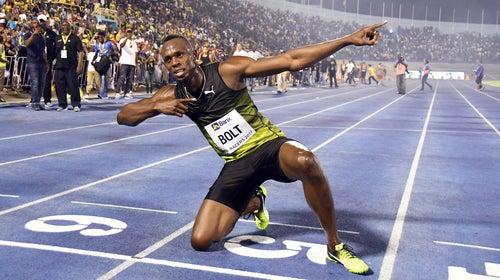 Jamaica's Usain Bolt celebrates after winning the 