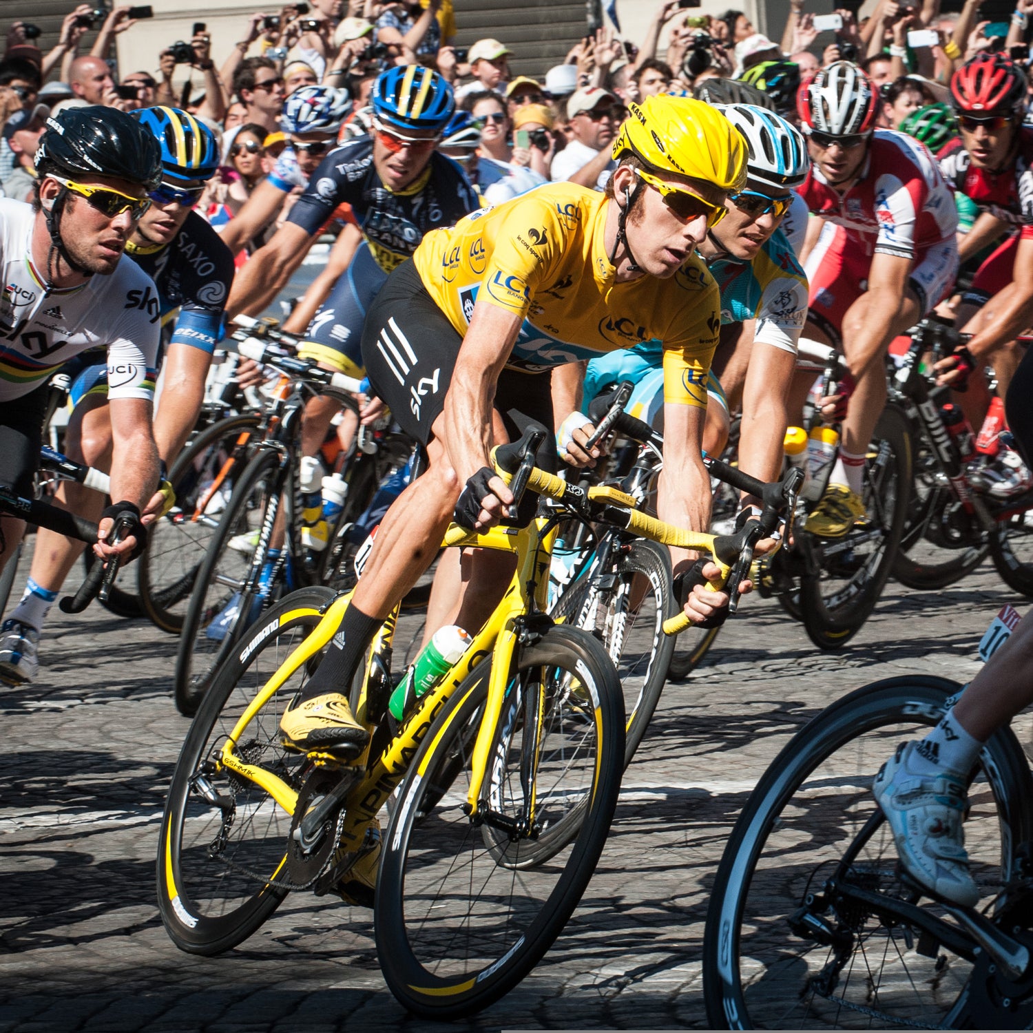 Bradley Wiggins wears the yellow shirt on his way to winning the 2012 Tour de France.