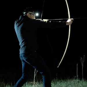 The author tries his luck with a bow.