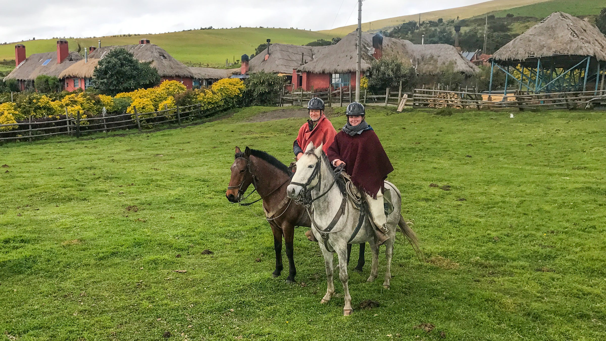 The author and his daughter making like chagras (Ecuadorean cowboys) at Hacienda El Porvenir.