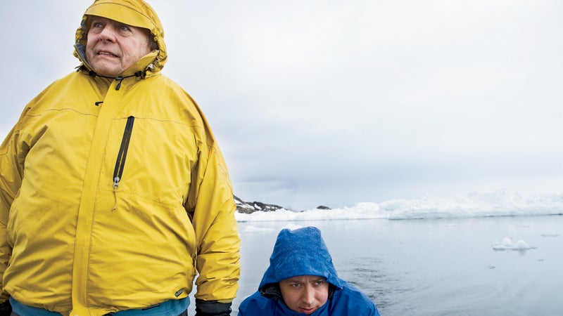 Father and son off Tasiilaq, Greenland