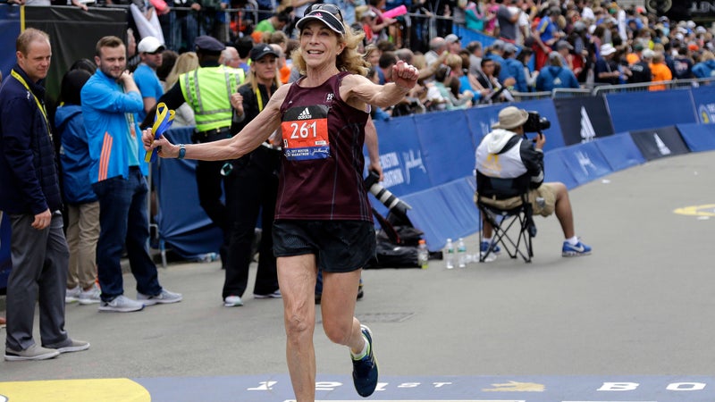 Kathrine Switzer crosses the finish line in the Boston Marathon, Monday, April 17, 2017.