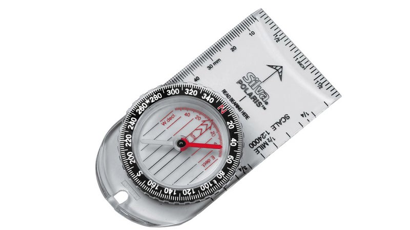 Any compass you want to use for navigation should look like this one. The prominent black arrow on the front is the direction of travel arrow. Inside the bezel, you can see the declination adjustments and the orienting lines. It also includes a scale for standard 1:24,000 topo maps, just to make estimating distances that much easier.