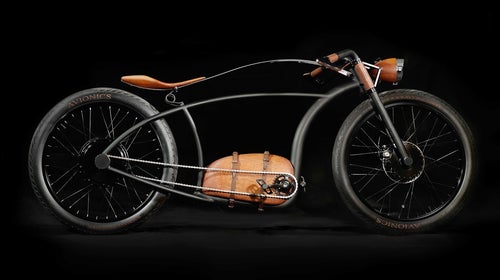 Complete with a headlight, taillight, and hydraulic disk brakes.